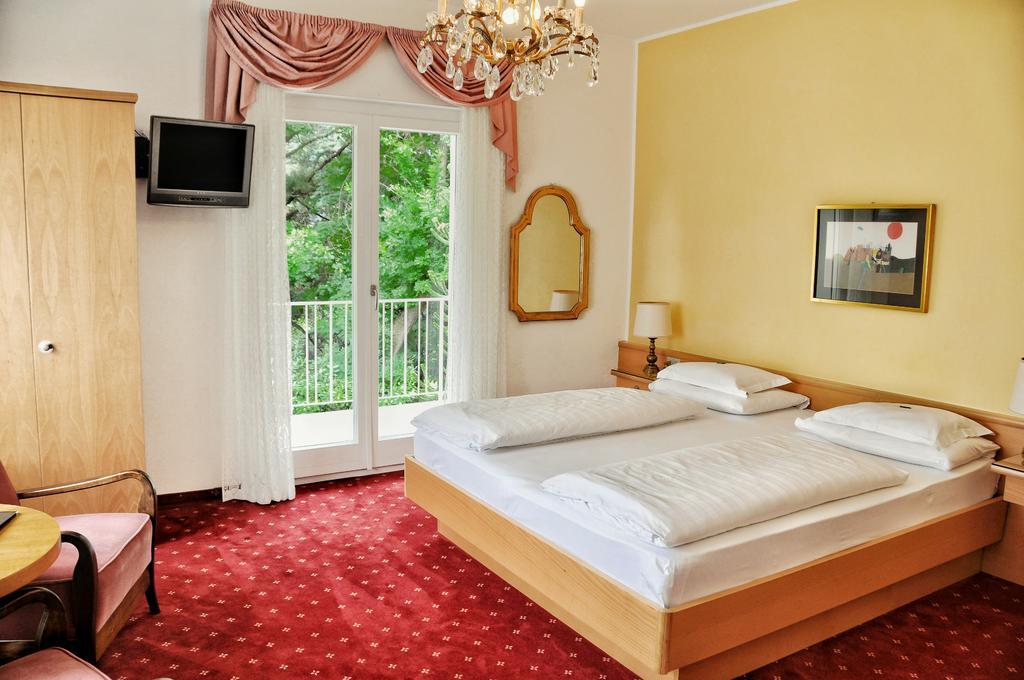 Hotel Zima Мерано Стая снимка